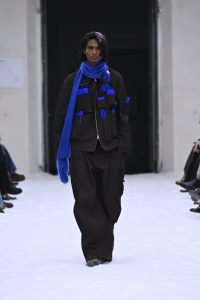 Shinya Kozuka’s Fall/Winter 2026 Pitti Uomo Debut: The Melancholy Commute and the Art of the Lone Glove.