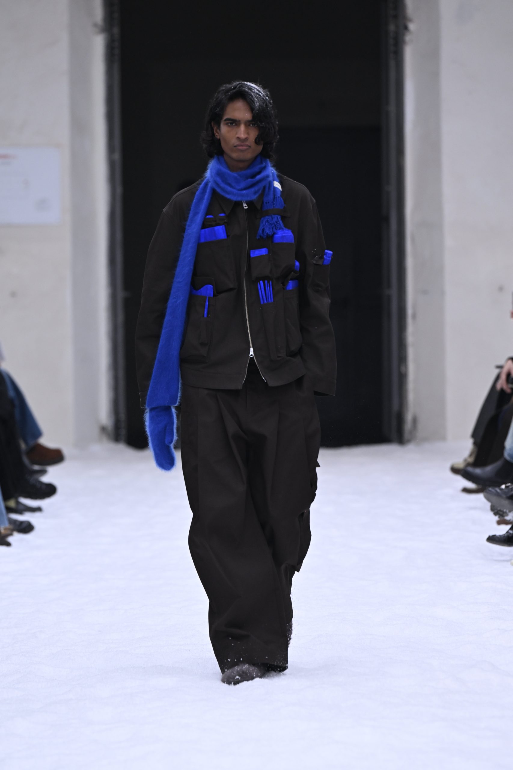 Shinya Kozuka’s Fall/Winter 2026 Pitti Uomo Debut: The Melancholy Commute and the Art of the Lone Glove.